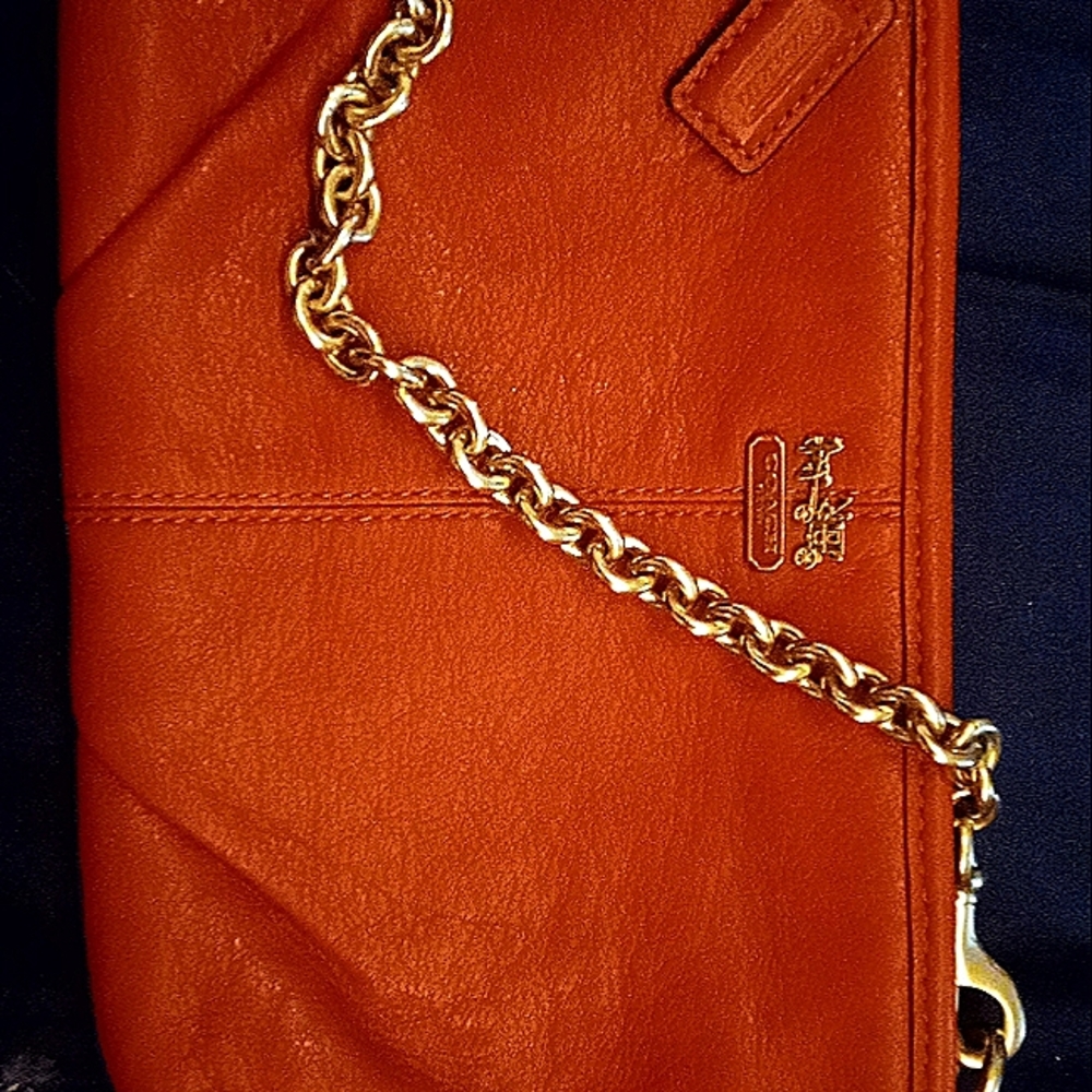 Leather orange and gold Coach Purse w/chain strap